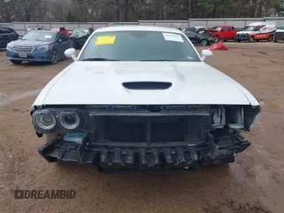 2021 Dodge Challenger GT z VIN 2C3CDZJG5MH674314, wystawiony jako IAAI lot #41593329 z przebiegiem 32 161 mil mil oraz . Historia ofert i sprzedaży dostępna na DreamBid. Obrazek 6.