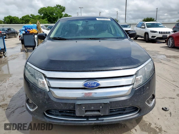 2012 Ford Fusion SEL z VIN 3FAHP0JA5CR258594, wystawiony jako Copart lot #60868635 z przebiegiem 162 274 mil mil oraz Czysty tytuł • Clean title. Historia ofert i sprzedaży dostępna na DreamBid. Obrazek 5.