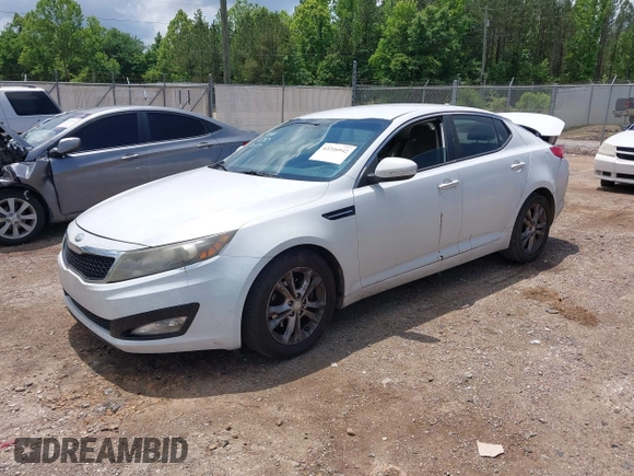2013 Kia Optima LX z VIN 5XXGM4A79DG170660, wystawiony jako IAAI lot #42216942 z przebiegiem 210 481 mil mil oraz . Historia ofert i sprzedaży dostępna na DreamBid. Obrazek 2.