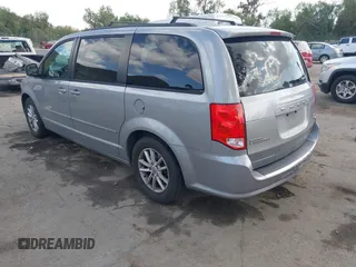 2016 Dodge Grand Caravan SXT with VIN 2C4RDGCG9GR180396, listed as a IAAI auction lot 41921312 with 130,256 mi miles and . Bid and sale history available at DreamBid. Image 3.
