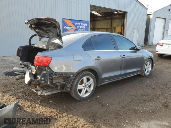 2013 Volkswagen Jetta Comfortline с VIN 3VWDL7AJ4DM408378, выставлен на аукционе Copart как лот 77094074 с пробегом 169 129 миль миль и Списание • Salvage title. История ставок и продаж доступна на DreamBid. Изображение 3.