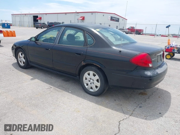 2003 Ford Taurus SE Standard with VIN 1FAFP53U13A102879, listed as a IAAI auction lot 42335795 with 193,023 mi miles and . Bid and sale history available at DreamBid. Image 3.