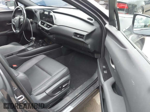 2023 Lexus UX 250h F Sport z VIN JTHB6JBH9P2132431, wystawiony jako IAAI lot #42137625 z przebiegiem 15 923 mil mil oraz . Historia ofert i sprzedaży dostępna na DreamBid. Obrazek 5.