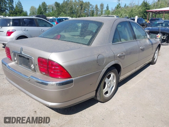 2000 Lincoln LS z VIN 1LNHM86S9YY852483, wystawiony jako IAAI lot #42292141 z przebiegiem 126 347 mil mil oraz . Historia ofert i sprzedaży dostępna na DreamBid. Obrazek 4.