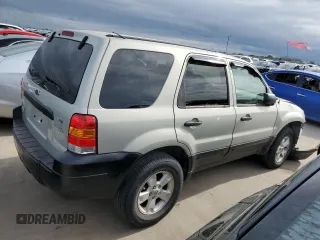 2005 Ford Escape XLT with VIN 1FMYU93105KC50944, listed as a Copart auction lot 50500965 with 133,532 mi miles and Salvage Title. Bid and sale history available at DreamBid. Image 3.