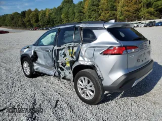 2023 Toyota Corolla Cross LE z VIN 7MUBAABG0PV074344, wystawiony jako Copart lot #70101104 z przebiegiem 9 577 mil mil oraz Szkoda całkowita • Salvage title. Historia ofert i sprzedaży dostępna na DreamBid. Obrazek 2.