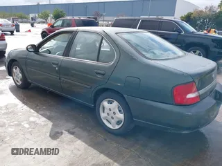 2000 Nissan Altima XE with VIN 1N4DL01D4YC102704, listed as a IAAI auction lot 41538425 with 228,639 mi miles. Bid and sale history available at carsss.com. Image 3.