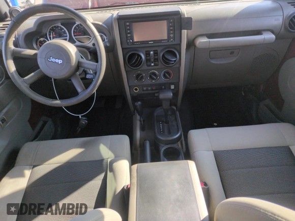 2010 Jeep Wrangler Unlimited Rubicon with VIN 1J4BA6H13AL140902, listed as a Copart auction lot 54335455 with 118,423 mi miles and Clean title. Bid and sale history available at DreamBid. Image 8.