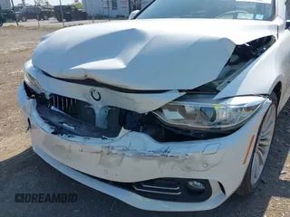 2015 BMW 4 Series 428i xDrive with VIN WBA3N5C52FK484864, listed as a IAAI auction lot 42569077 with 95,431 mi miles and . Bid and sale history available at DreamBid. Image 6.
