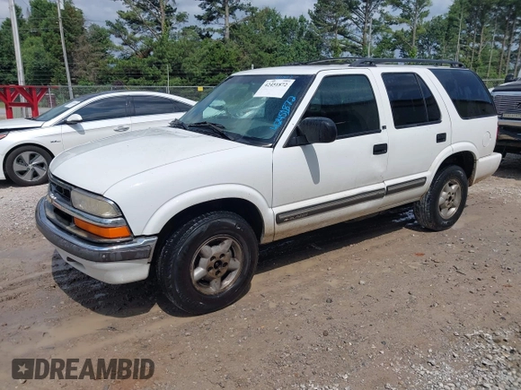2001 Chevrolet Blazer LT z VIN 1GNDT13W712201180, wystawiony jako IAAI lot #42451872 z przebiegiem 88 433 mil mil oraz . Historia ofert i sprzedaży dostępna na DreamBid. Obrazek 2.