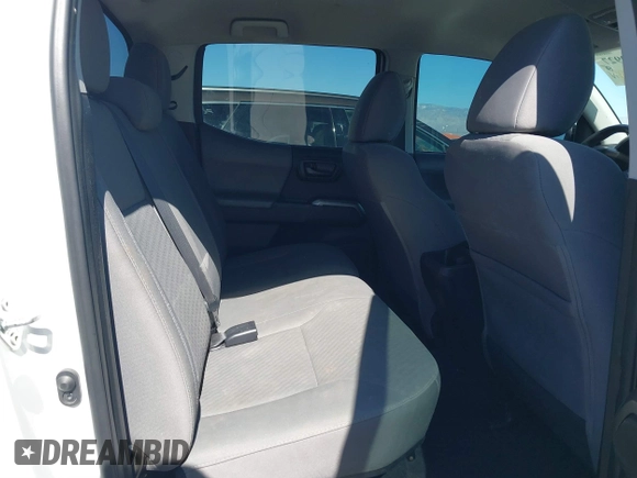 2021 Toyota Tacoma SR with VIN 3TYAX5GN5MT014868, listed as a IAAI auction lot 41549927 with 30,653 mi miles and . Bid and sale history available at DreamBid. Image 8.