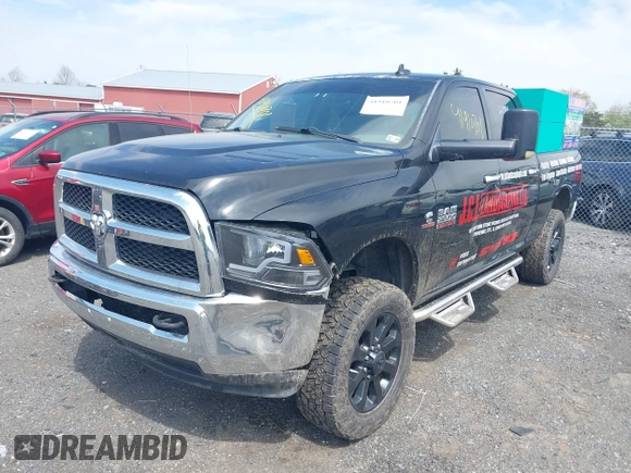 2013 Ram 2500 Big Horn z VIN 3C6UR5DL9DG549987, wystawiony jako IAAI lot #41910701 z przebiegiem 217 477 mil mil oraz . Historia ofert i sprzedaży dostępna na DreamBid. Obrazek 2.