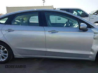 2019 Ford Fusion SE with VIN 3FA6P0HD4KR219338, listed as a IAAI auction lot 41856817 with 82,385 mi miles and . Bid and sale history available at carsss.com. Image 13.