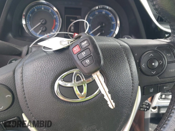 2017 Toyota Corolla L with VIN 2T1BURHE6HC831795, listed as a IAAI auction lot 42561179 with 94,236 mi miles and . Bid and sale history available at DreamBid. Image 11.