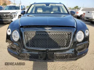 2017 Bentley Bentayga W12 z VIN SJAAC2ZV5HC015773, wystawiony jako Copart lot #66370354 z przebiegiem 65 944 mil mil oraz Szkoda całkowita • Salvage title. Historia ofert i sprzedaży dostępna na DreamBid. Obrazek 5.