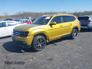 2018 Volkswagen Atlas SE with VIN 1V2KR2CA6JC535525, listed as a IAAI auction lot 41971141 with 62,514 mi miles and . Bid and sale history available at DreamBid. Image 2.