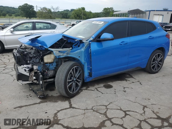 2023 BMW X2 sDrive28i with VIN WBXYH9C08P5V32303, listed as a Copart auction lot 64951994 with 22,462 mi miles and Salvage Title. Bid and sale history available at carsss.com. Image 1.