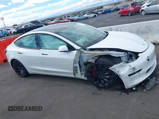 2022 Tesla Model 3 Performance with VIN 5YJ3E1EC6NF111958, listed as a IAAI auction lot 41583972 with 28,431 mi miles and . Bid and sale history available at DreamBid. Image 12.