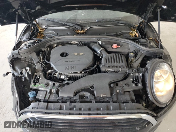 2016 MINI Clubman z VIN WMWLN5C51G2B28099, wystawiony jako Copart lot #55139845 z przebiegiem 89 683 mil mil oraz Szkoda całkowita • Salvage title. Historia ofert i sprzedaży dostępna na DreamBid. Obrazek 11.