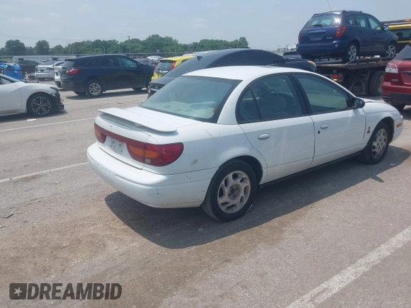 2002 Saturn SL с VIN 1G8ZK52732Z222128, выставлен на аукционе IAAI как лот 42476981 с пробегом 165 454 миль миль и . История ставок и продаж доступна на DreamBid. Изображение 4.