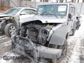 2014 Jeep Wrangler Unlimited Sport with VIN 1C4HJWDG1EL302087, listed as a IAAI auction lot 41420740 with 152,096 mi miles. Bid and sale history available at carsss.com. Image 18.