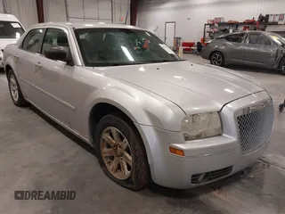 2006 Chrysler 300 Touring with VIN 2C3KA53G36H506880, listed as a IAAI auction lot 42177012 with 135,992 mi miles. Bid and sale history available at carsss.com. Image 1.