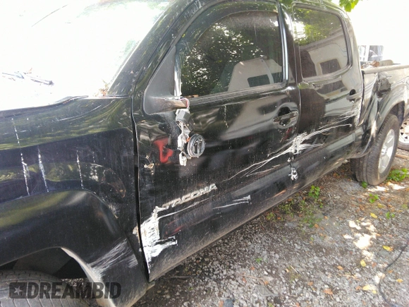 2014 Toyota Tacoma with VIN 3TMMU4FN6EM072471, listed as a IAAI auction lot 42525218 with 150,461 mi miles and . Bid and sale history available at DreamBid. Image 12.
