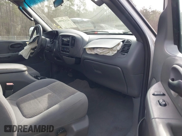 2003 Ford F-150 XLT with VIN 1FTRW08L73KA73945, listed as a IAAI auction lot 41474904 with 122,080 mi miles. Bid and sale history available at carsss.com. Image 5.
