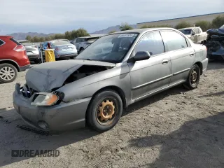 2003 Kia Spectra with VIN KNAFB121935265035, listed as a Copart auction lot 86407934 with 201,586 mi miles and Salvage Title. Bid and sale history available at DreamBid. Image 1.