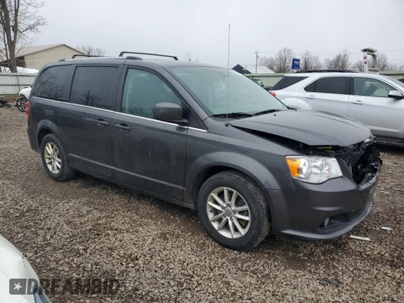 2019 Dodge Grand Caravan SXT with VIN 2C4RDGCGXKR518476, listed as a Copart auction lot 52341455 with 59,102 mi miles and Salvage Title. Bid and sale history available at DreamBid. Image 4.