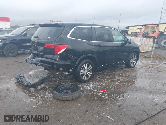 2016 Honda Pilot EX-L with VIN 5FNYF5H56GB031831, listed as a IAAI auction lot 41111342 with 244,197 mi miles and . Bid and sale history available at DreamBid. Image 4.