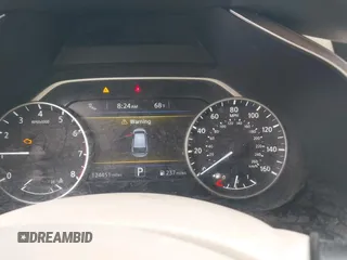 2016 Nissan Murano Platinum with VIN 5N1AZ2MG6GN106877, listed as a IAAI auction lot 41447698 with 124,451 mi miles and . Bid and sale history available at DreamBid. Image 7.