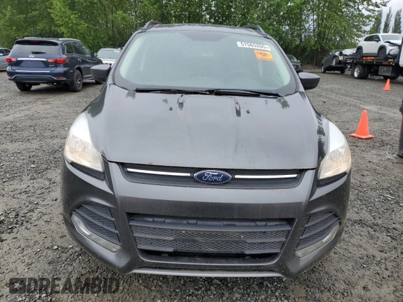 2016 Ford Escape SE z VIN 1FMCU0GX9GUC69200, wystawiony jako Copart lot #57565265 z przebiegiem 131 353 mil mil oraz Czysty tytuł • Clean title. Historia ofert i sprzedaży dostępna na DreamBid. Obrazek 5.