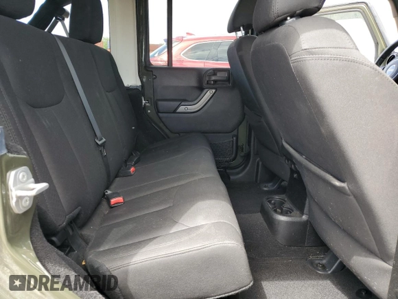 2015 Jeep Wrangler Unlimited Sport with VIN 1C4BJWDG4FL766904, listed as a Copart auction lot 58126555 with 68,400 mi miles and Salvage title. Bid and sale history available at DreamBid. Image 11.
