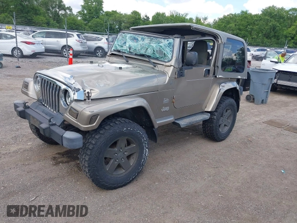 2004 Jeep Wrangler Sahara with VIN 1J4FA59S54P740417, listed as a IAAI auction lot 42382078 with 200,108 mi miles and . Bid and sale history available at DreamBid. Image 2.