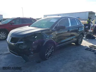 2015 Lincoln MKC with VIN 5LMCJ1A90FUJ03877, listed as a IAAI auction lot 41442942 with 197,000 mi miles. Bid and sale history available at carsss.com. Image 17.
