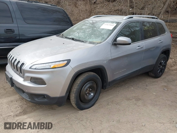 2016 Jeep Cherokee Latitude with VIN 1C4PJMCB7GW252724, listed as a IAAI auction lot 41869060 with 125,119 mi miles. Bid and sale history available at carsss.com. Image 2.