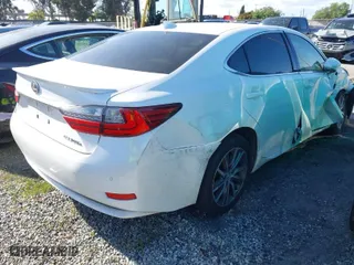2016 Lexus ES 300h Hybrid with VIN JTHBW1GG0G2101603, listed as a IAAI auction lot 41677725 with 148,182 mi miles. Bid and sale history available at carsss.com. Image 4.