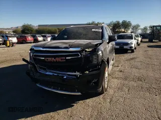 2022 GMC Yukon SLT with VIN 1GKS2BKD5NR356479, listed as a Copart auction lot 77674304 with 33,580 mi miles and Salvage Title. Bid and sale history available at carsss.com. Image 11.