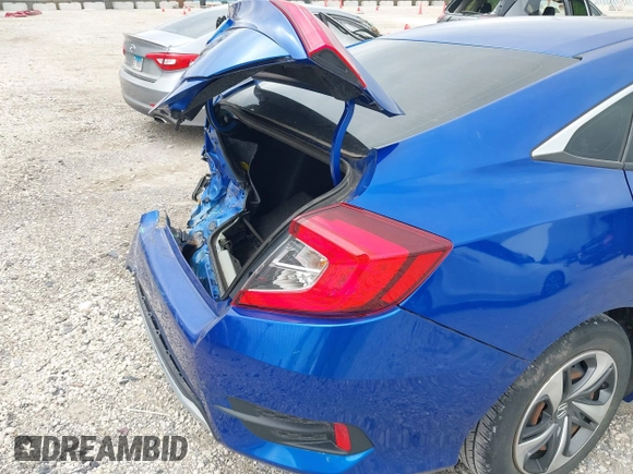 2020 Honda Civic LX with VIN 2HGFC2F69LH550744, listed as a IAAI auction lot 42079594 with 34,724 mi miles and . Bid and sale history available at DreamBid. Image 19.