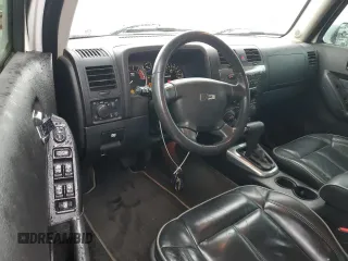 2009 Hummer H3 SUV with VIN 5GTEN13E298115856, listed as a Copart auction lot 81994024 with 303,563 mi miles and Clean Title. Bid and sale history available at carsss.com. Image 8.