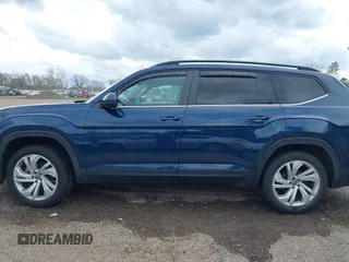 2021 Volkswagen Atlas SE z VIN 1V2JR2CA9MC547054, wystawiony jako IAAI lot #42090923 z przebiegiem 40 011 mil mil oraz . Historia ofert i sprzedaży dostępna na DreamBid. Obrazek 15.