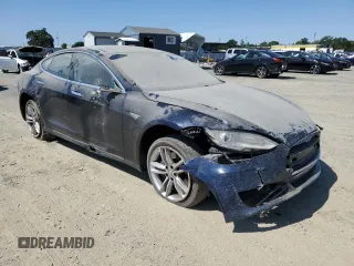 2013 Tesla Model S with VIN 5YJSA1AC9DFP10400, listed as a Copart auction lot 64096555 with 165,166 mi miles and Salvage title. Bid and sale history available at DreamBid. Image 4.