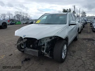 2015 BMW X5 sDrive35i with VIN 5UXKR2C54F0H34975, listed as a IAAI auction lot 41704467 with 92,006 mi miles. Bid and sale history available at carsss.com. Image 2.