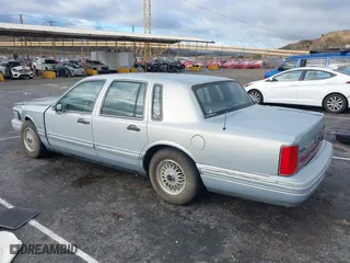 1993 Lincoln Town Car Executive with VIN 1LNLM81W6PY618899, listed as a IAAI auction lot 41566437 with 158,821 mi miles. Bid and sale history available at carsss.com. Image 3.