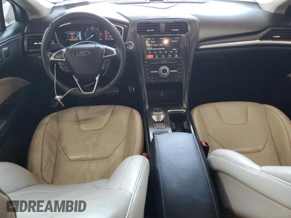 2017 Ford Fusion Hybrid Titanium z VIN 3FA6P0RU3HR400034, wystawiony jako Copart lot #62689795 z przebiegiem 109 118 mil mil oraz Szkoda całkowita • Salvage title. Historia ofert i sprzedaży dostępna na DreamBid. Obrazek 8.