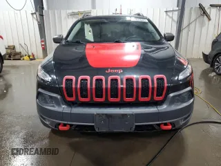 2015 Jeep Cherokee Trailhawk with VIN 1C4PJMBS5FW587545, listed as a Copart auction lot 58820685 with 136,755 mi miles and Salvage title. Bid and sale history available at DreamBid. Image 5.