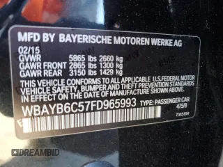 2015 BMW 7 Series 750i xDrive with VIN WBAYB6C57FD965993, listed as a Copart auction lot 83871924 with 76,720 mi miles and Salvage Title. Bid and sale history available at carsss.com. Image 12.