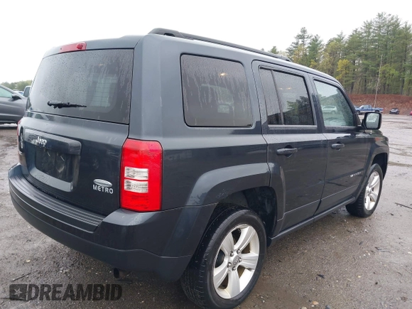 2014 Jeep Patriot Latitude with VIN 1C4NJRFB6ED689459, listed as a IAAI auction lot 42197469 with 202,899 mi miles. Bid and sale history available at carsss.com. Image 4.