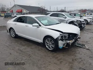2016 Lincoln MKZ with VIN 3LN6L2J94GR629308, listed as a IAAI auction lot 41235071 with 115,044 mi miles. Bid and sale history available at carsss.com. Image 1.